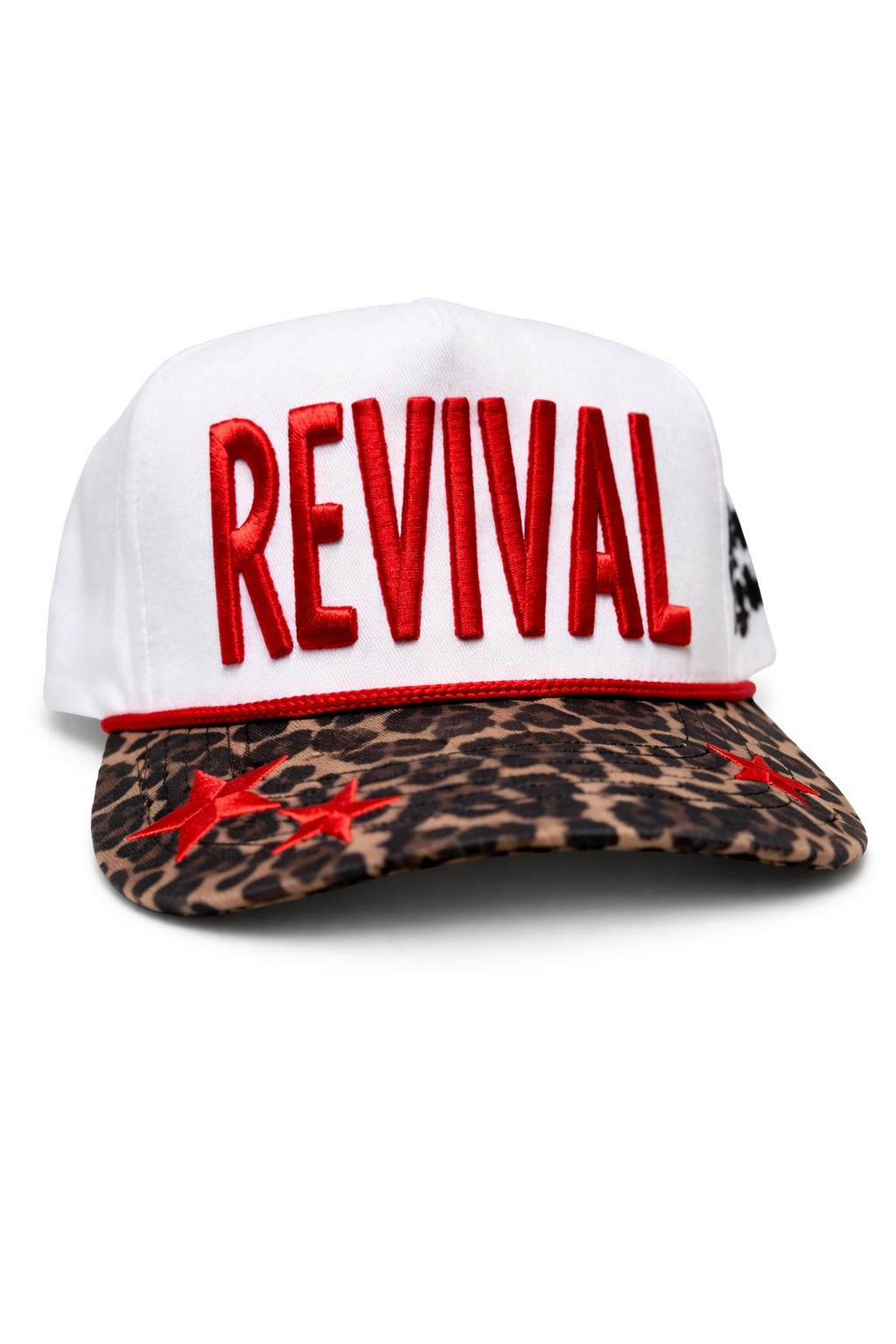 White cap with red 'REVIVAL' text and leopard print brim on a white background