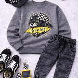 Gray sweatshirt with panther graphic, black jeans, checkered cap, sneakers, and vintage game console on a light gray background.