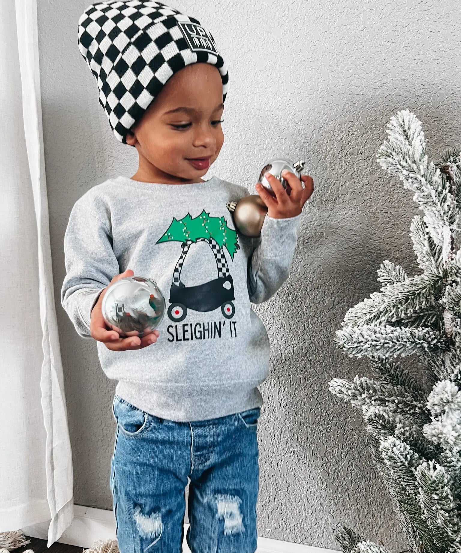 Sleighin' It Crewneck Raising Brave