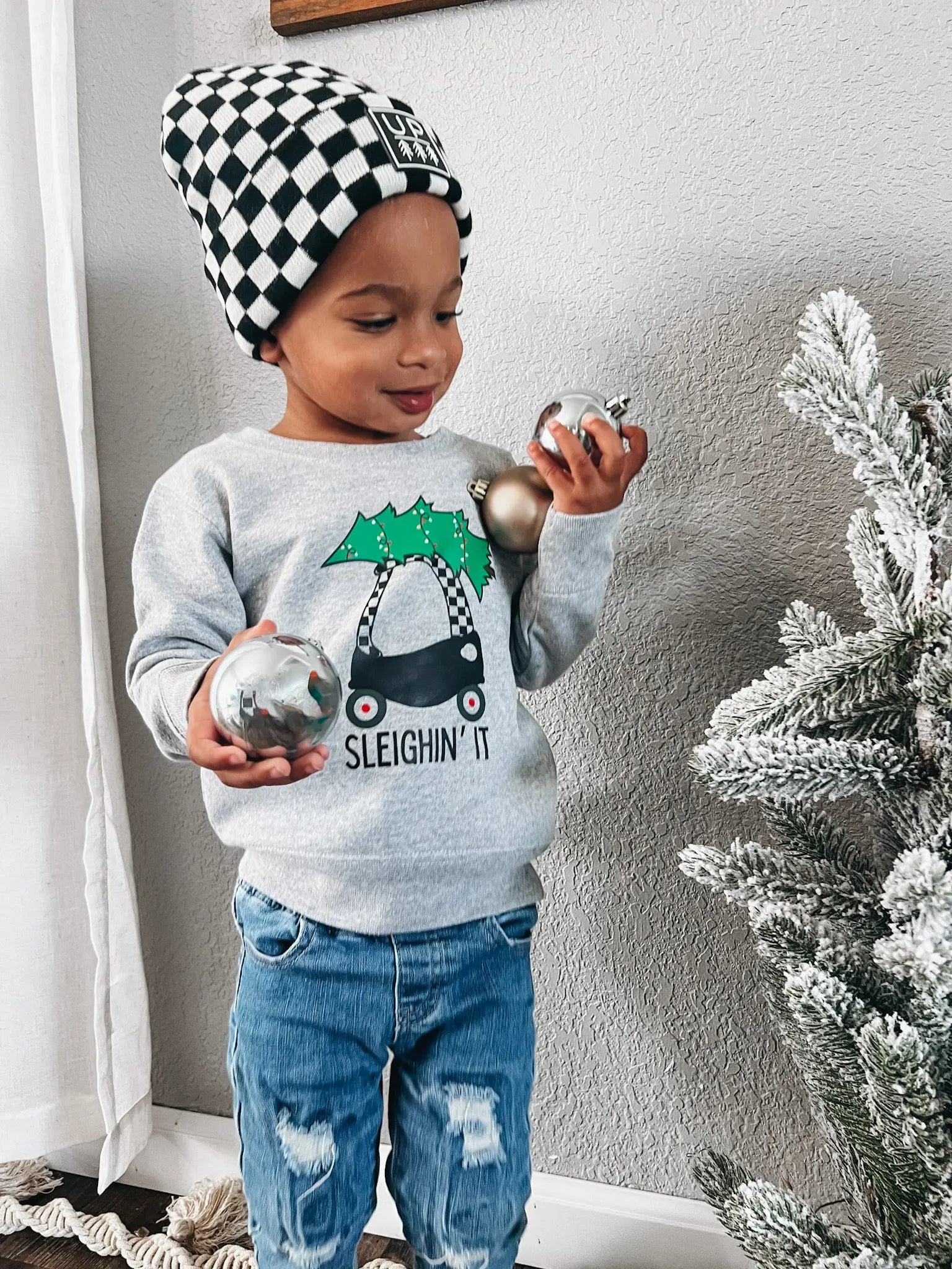 Sleighin' It Crewneck Raising Brave