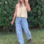 Women in Embroidered Floral Jeans Outside.