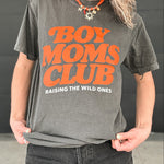 Person wearing a gray t-shirt with 'BOY MOMS CLUB' text in orange.