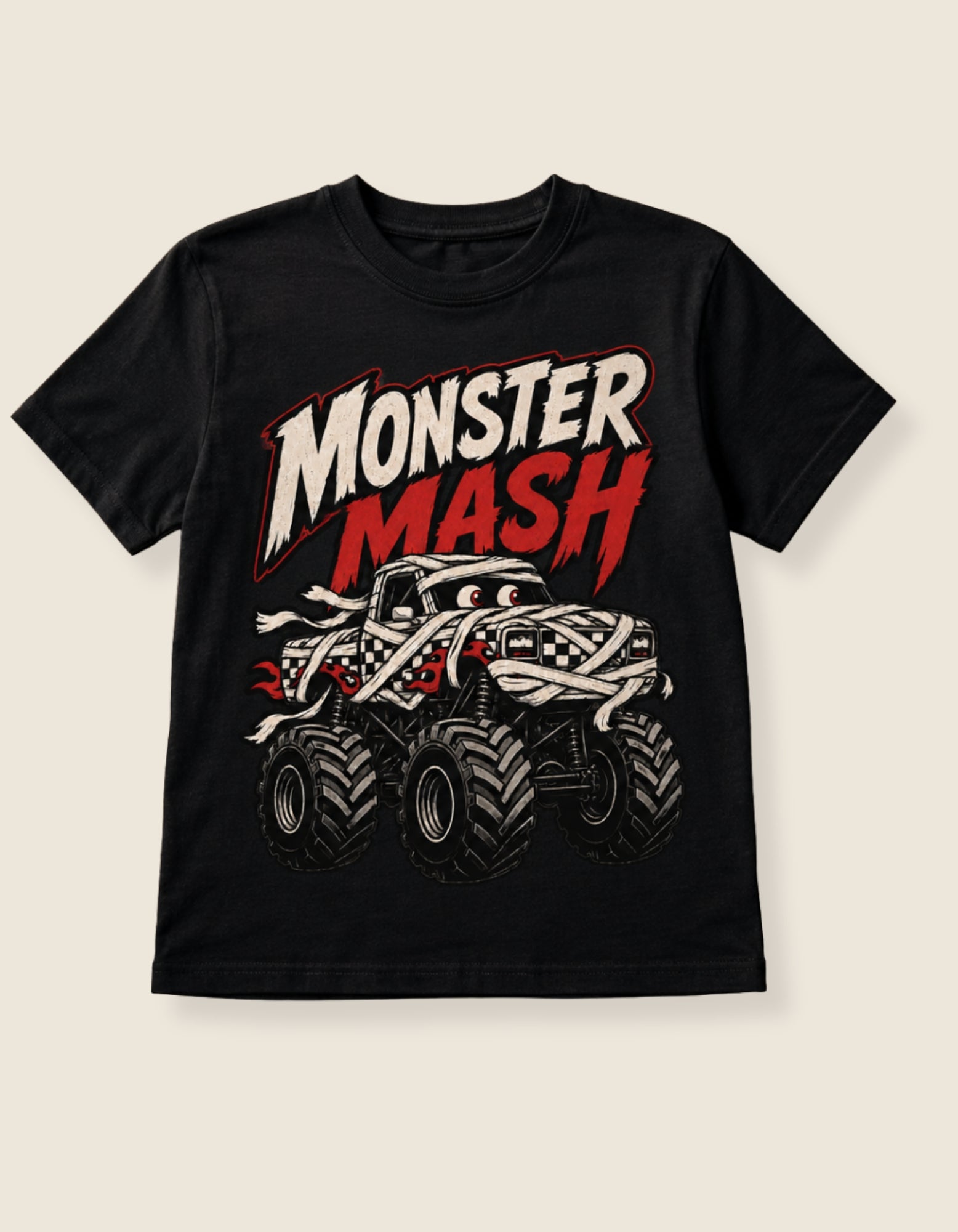 A black short-sleeve t-shirt with a 'Monster Mash' graphic on the front, featuring a stylized monster truck and bold text, displayed against a light beige background.