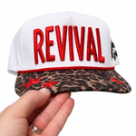 Cap with 'REVIVAL' text on a white background