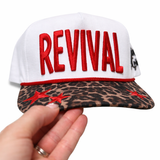 Cap with 'REVIVAL' text on a white background